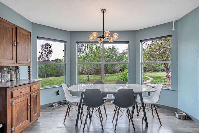 255 Mesquite Dr, Cedar Creek, TX 78612 - dining space featuring a chandelier and wood finished floors