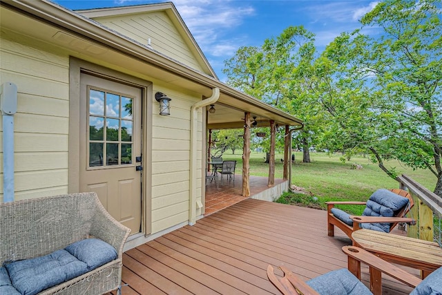 255 Mesquite Dr, Cedar Creek, TX 78612 - wooden terrace featuring a lawn