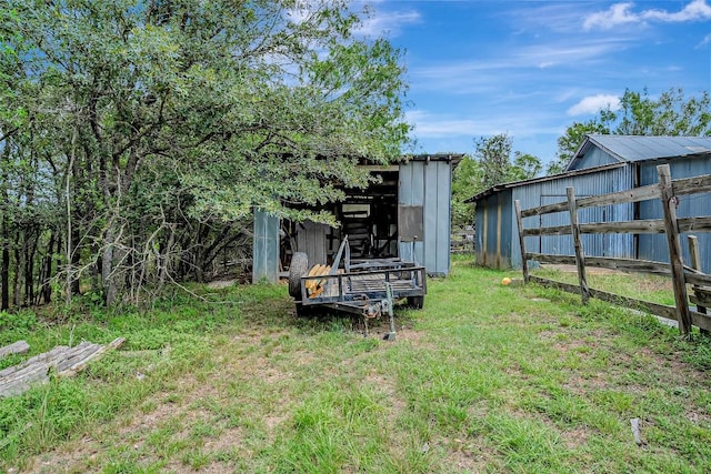 255 Mesquite Dr, Cedar Creek, TX 78612 - view of yard with a pole building and an outbuilding