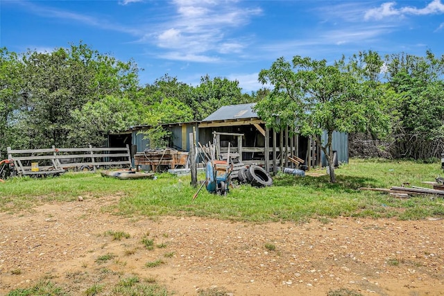 255 Mesquite Dr, Cedar Creek, TX 78612 - view of yard featuring an outdoor structure