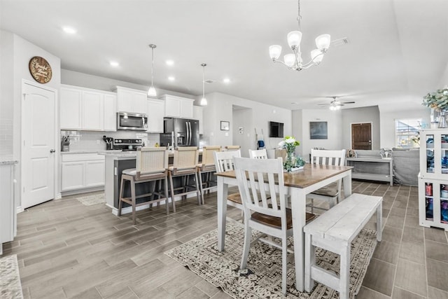 5867 Copano Loop, Belton, TX 76513 - dining space with ceiling fan, a chandelier, recessed lighting, and light wood-style flooring