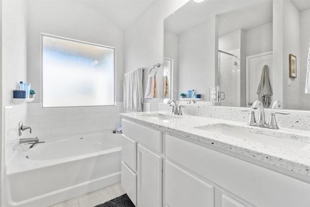 5867 Copano Loop, Belton, TX 76513 - bathroom featuring a shower stall, a garden tub, double vanity, and tile patterned flooring