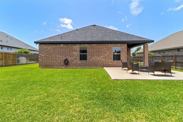 7516 Hardin Dr, Temple, TX 76502 - back of property featuring a fenced backyard, brick siding, roof with shingles, and a patio area