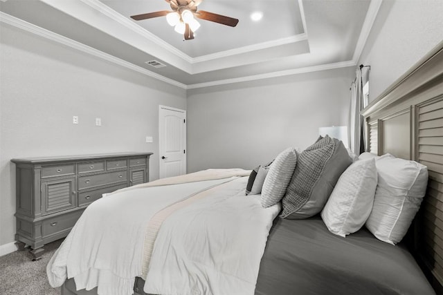 7516 Hardin Dr, Temple, TX 76502 - bedroom featuring a tray ceiling, ornamental molding, and a ceiling fan