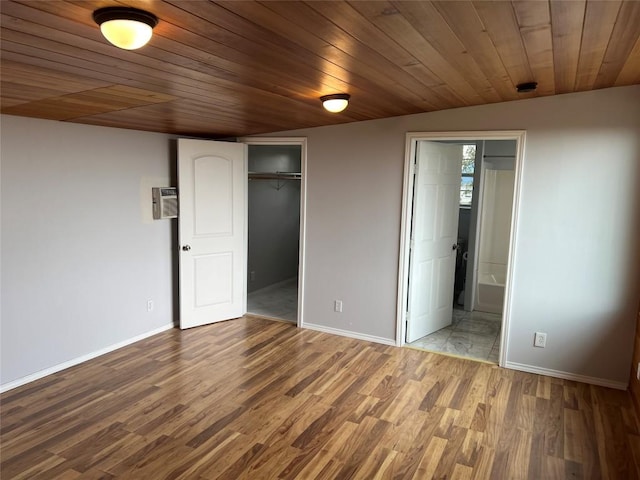 3819 Ranch Road 620th Rd N, Austin, TX 78734 - unfurnished bedroom featuring wood finished floors, a closet, wood ceiling, and ensuite bathroom
