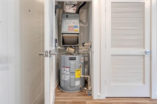 4802 S Congress Ave Unit 217, Austin, TX 78745 - utility room featuring water heater