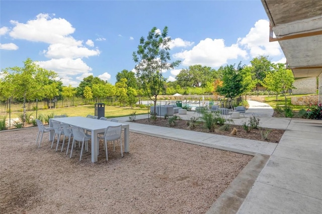 4802 S Congress Ave Unit 217, Austin, TX 78745 - view of yard with a patio area, outdoor dining area, and an outdoor hangout area