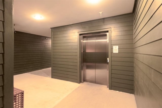 4802 S Congress Ave Unit 217, Austin, TX 78745 - view of exterior entry with elevator and a patio area