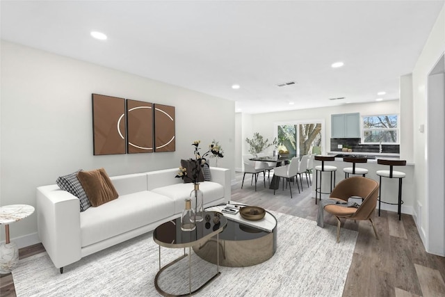 9417 N Creek Dr, Austin, TX 78753 - living room with light wood-style flooring and recessed lighting
