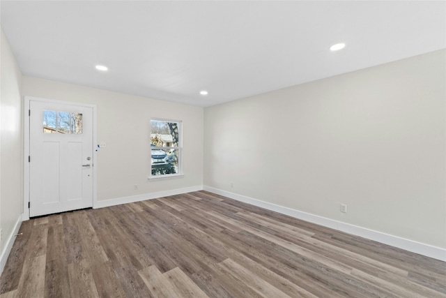 9417 N Creek Dr, Austin, TX 78753 - entryway featuring healthy amount of natural light, wood finished floors, and recessed lighting
