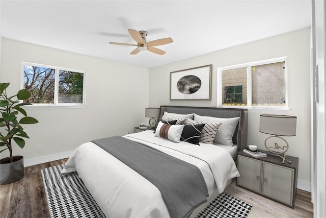 9417 N Creek Dr, Austin, TX 78753 - bedroom featuring wood finished floors and a ceiling fan
