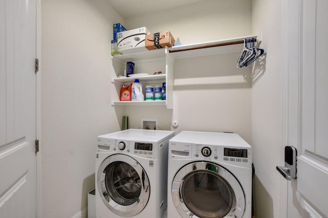 2521 Blended Tree Ranch Dr, Leander, TX 78641 - laundry area with washing machine and clothes dryer