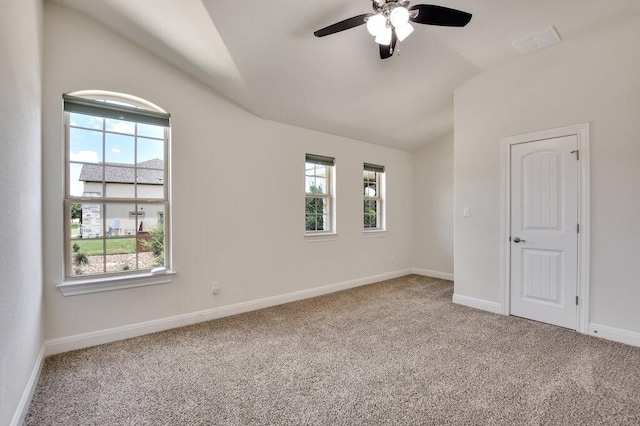 2521 Blended Tree Ranch Dr, Leander, TX 78641 - spare room featuring vaulted ceiling, carpet floors, plenty of natural light, and ceiling fan