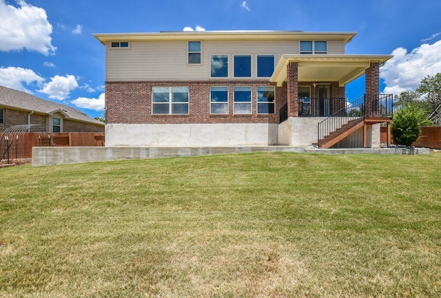 2521 Blended Tree Ranch Dr, Leander, TX 78641 - back of property featuring stairs and brick siding