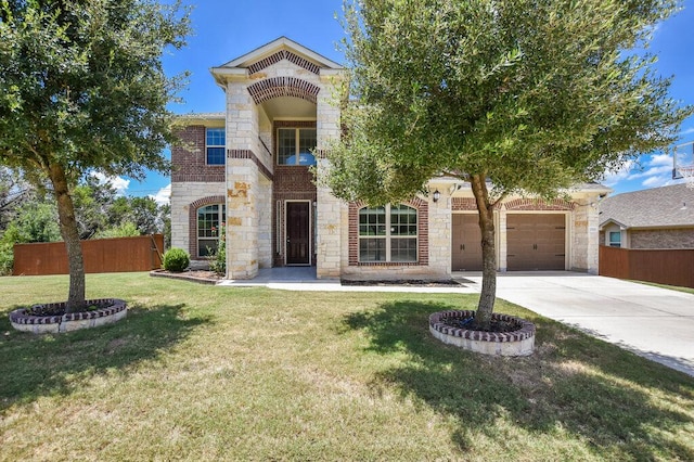 2521 Blended Tree Ranch Dr, Leander, TX 78641 - view of front of property with an attached garage, stone siding, concrete driveway, and brick siding