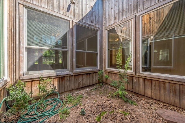 7 Hillway Dr, Round Rock, TX 78664 - unfurnished sunroom featuring wood walls