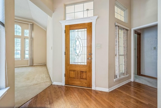 7 Hillway Dr, Round Rock, TX 78664 - carpeted entryway featuring wood finished floors and baseboards