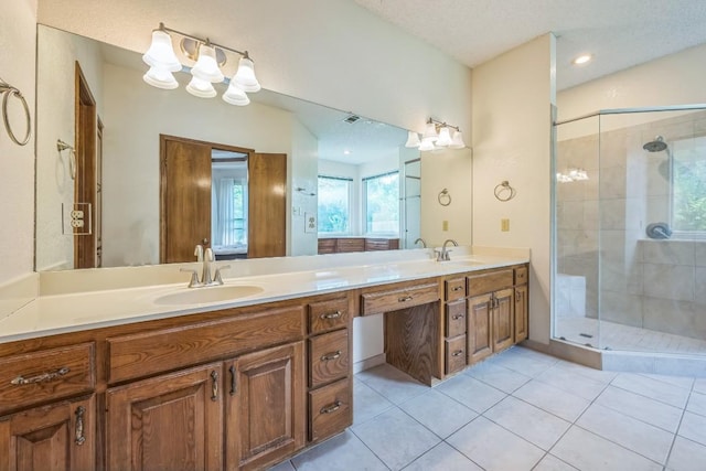 7 Hillway Dr, Round Rock, TX 78664 - full bath with double vanity, a shower stall, and tile patterned floors