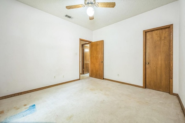 7 Hillway Dr, Round Rock, TX 78664 - unfurnished bedroom featuring light colored carpet and a ceiling fan