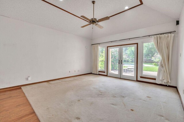 7 Hillway Dr, Round Rock, TX 78664 - spare room featuring french doors, a textured ceiling, vaulted ceiling, a ceiling fan, and recessed lighting
