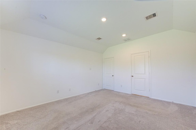 2928 Tantara Dr, Katy, TX 77493 - spare room featuring lofted ceiling, light carpet, and recessed lighting
