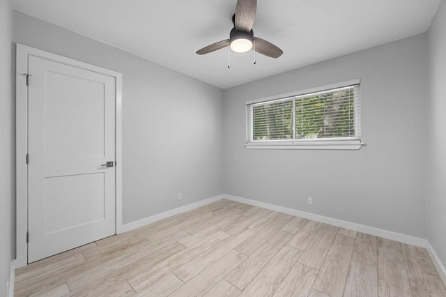 11508 Bell Ave, Austin, TX 78759 - empty room with light wood finished floors and a ceiling fan