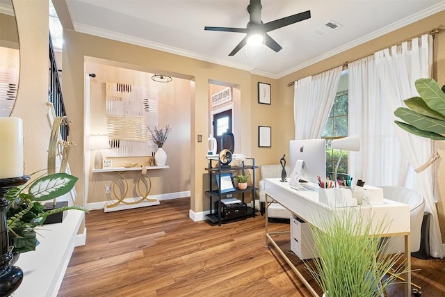 14908 Chamomile Cv, Pflugerville, TX 78660 - office featuring wood finished floors, ornamental molding, and a ceiling fan
