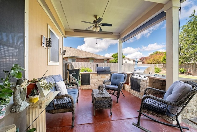 14908 Chamomile Cv, Pflugerville, TX 78660 - fenced backyard featuring an outdoor kitchen, ceiling fan, and a patio