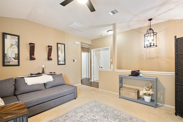 14908 Chamomile Cv, Pflugerville, TX 78660 - carpeted living area with a ceiling fan and vaulted ceiling