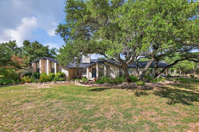 23644 Nameless Rd, Leander, TX 78641 - mid-century inspired home featuring a front yard
