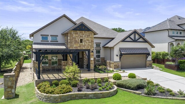 3937 Veneto Cir, Leander, TX 78641 - view of front of property with stone siding, stucco siding, an attached garage, and concrete driveway