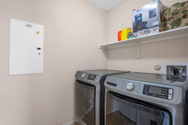 8925 China Rose Dr, Austin, TX 78724 - washroom featuring washer and dryer and baseboards