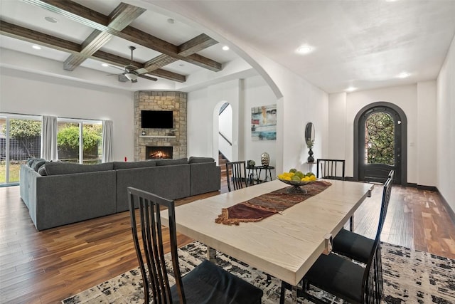 1310 Minnie Dr, Austin, TX 78732 - dining room with hardwood / wood-style flooring, plenty of natural light, ceiling fan, a fireplace, and beam ceiling