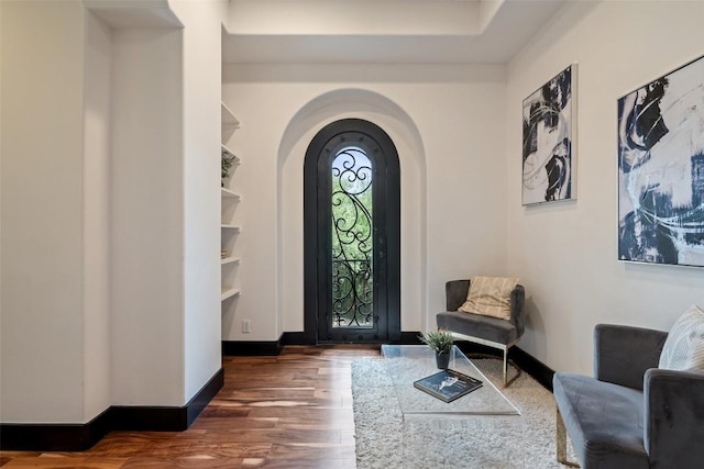 1310 Minnie Dr, Austin, TX 78732 - entrance foyer featuring wood finished floors and arched walkways