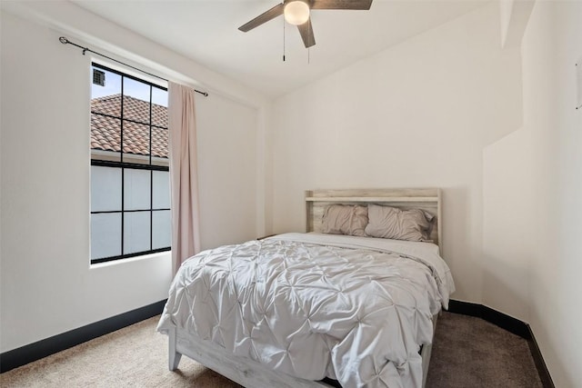 1310 Minnie Dr, Austin, TX 78732 - carpeted bedroom featuring baseboards and a ceiling fan