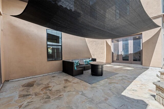 1310 Minnie Dr, Austin, TX 78732 - view of patio / terrace featuring french doors and an outdoor hangout area