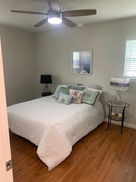 6004 Blythewood Dr, Austin, TX 78745 - bedroom with wood finished floors and a ceiling fan