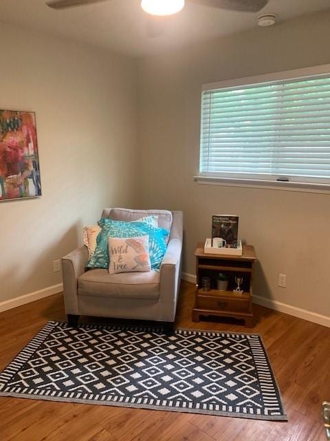 6004 Blythewood Dr, Austin, TX 78745 - sitting room with baseboards and wood finished floors