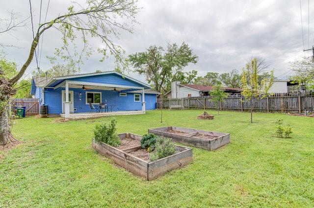 6004 Blythewood Dr, Austin, TX 78745 - fenced backyard featuring a garden