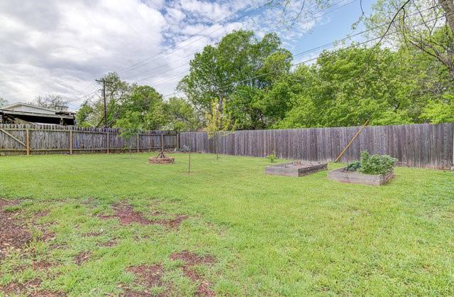 6004 Blythewood Dr, Austin, TX 78745 - fenced backyard with a garden