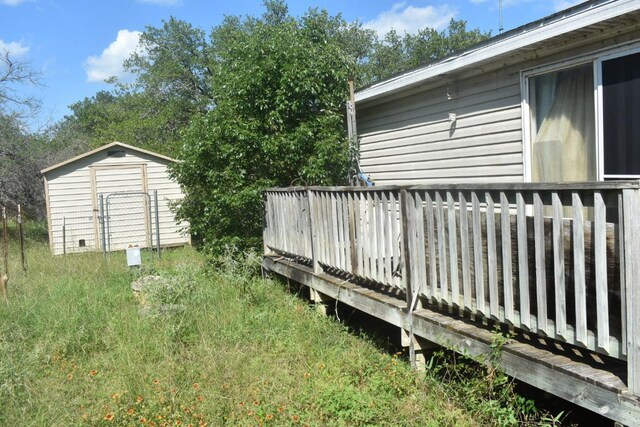 1800 Thousand Oaks Trl, Liberty Hill, TX 78642 - view of yard with a storage shed and a wooden deck