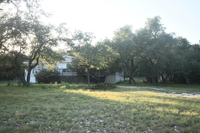 1800 Thousand Oaks Trl, Liberty Hill, TX 78642 - view of yard featuring a deck