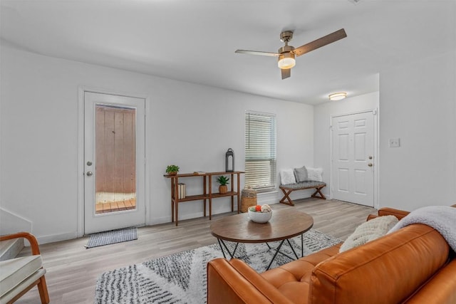 837 Mica Ln, Leander, TX 78641 - living room with ceiling fan and light wood finished floors