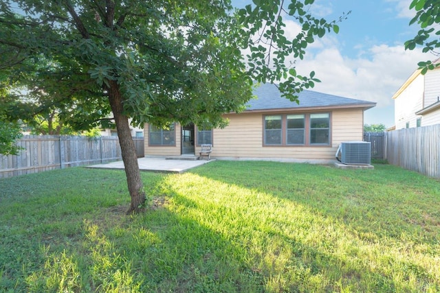 913 Mahomet Dr, Pflugerville, TX 78660 - back of house featuring a patio, a fenced backyard, and roof with shingles