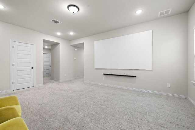 2433 Roaring River Trl, Leander, TX 78641 - carpeted cinema featuring recessed lighting