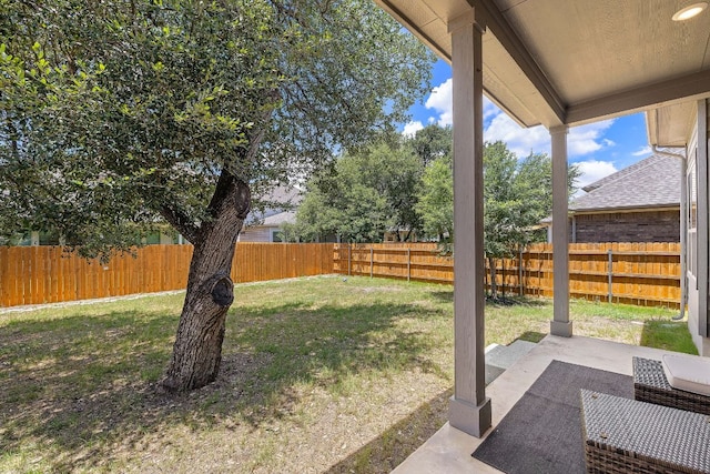2433 Roaring River Trl, Leander, TX 78641 - fenced backyard with a patio area
