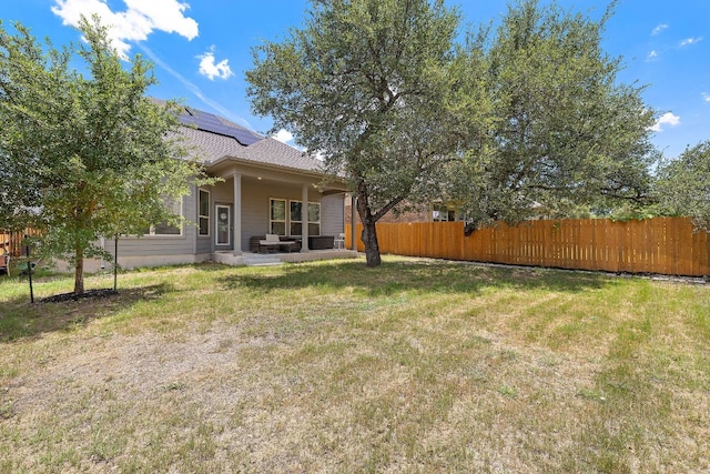 2433 Roaring River Trl, Leander, TX 78641 - fenced backyard featuring a patio area
