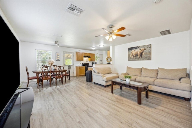8710 Davis Oaks Trl, Austin, TX 78748 - living room featuring light wood-style flooring and ceiling fan