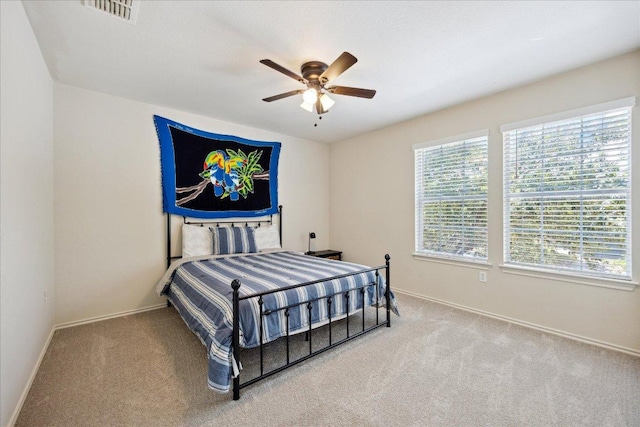8710 Davis Oaks Trl, Austin, TX 78748 - carpeted bedroom featuring baseboards and a ceiling fan
