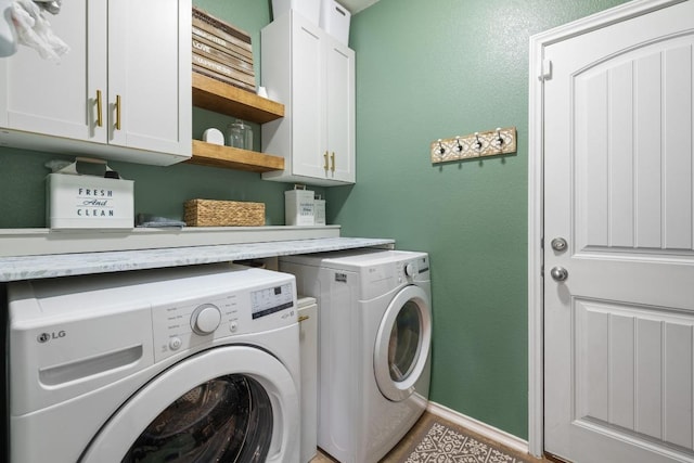 901 Water Hyacinth Loop, Leander, TX 78641 - washroom with independent washer and dryer, cabinet space, and a textured wall
